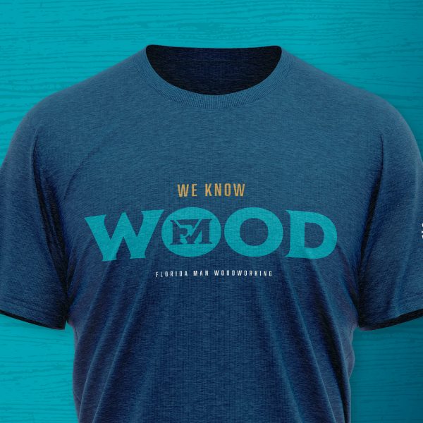 We Know Wood: Professional logo and custom web design for a woodworking business, displayed on a blue branded t-shirt.